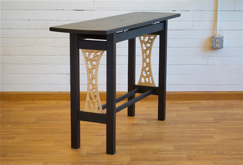 Wenge hallway table with sculpted maple side panels.  54